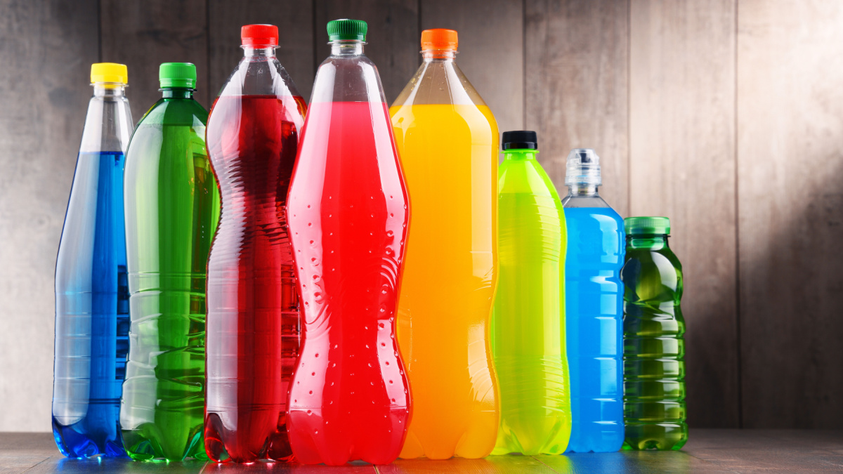 various brightly coloured drinks in bottles