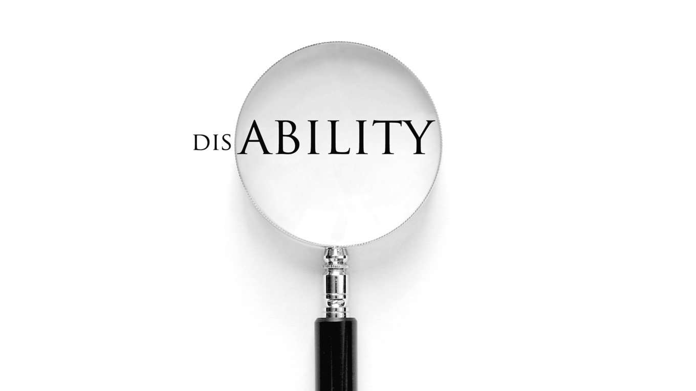 "Disability" with magnifying glass over "ability"