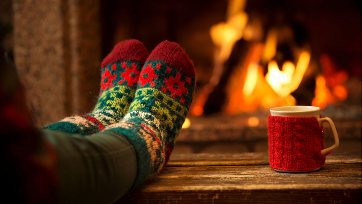 Woman meditating to get mentally prepared for Christmas tasks