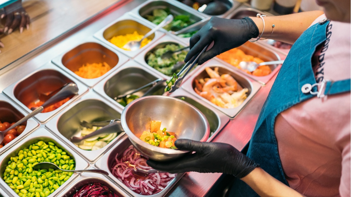 Deli food server wearing gloves