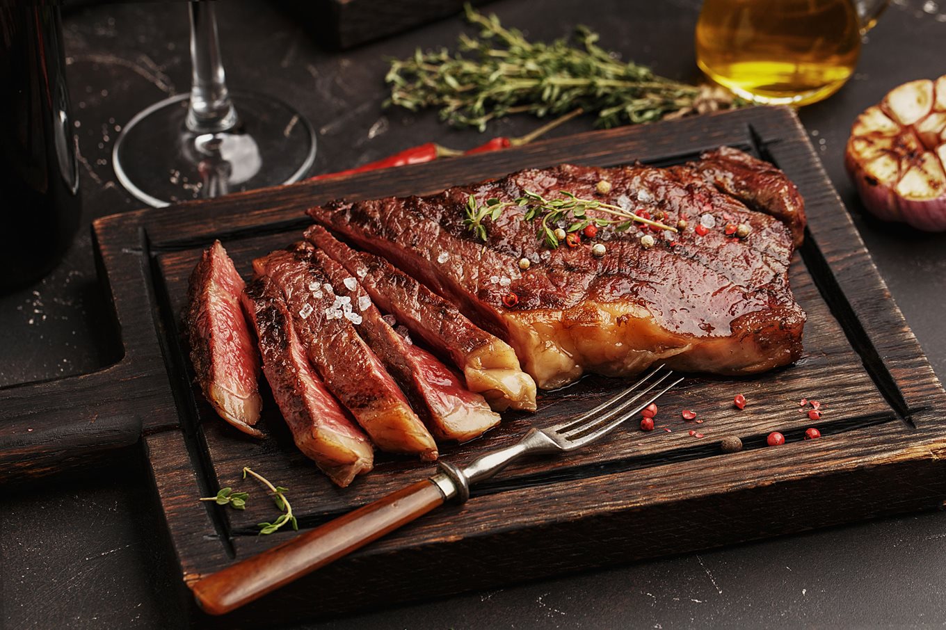Why It Can Be Dangerous To Cut Meat On A Wooden Board