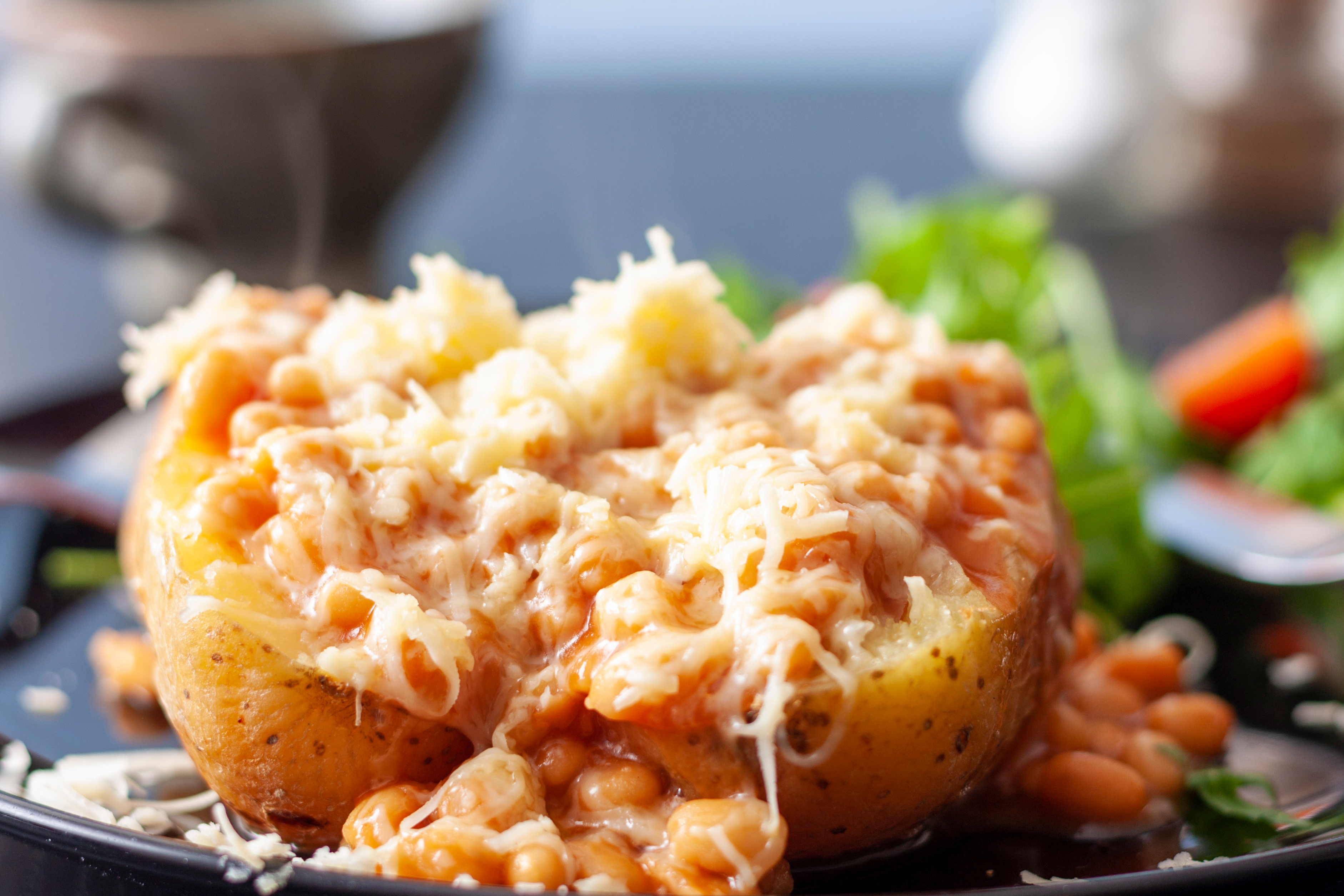 Baked potato with beans and cheese