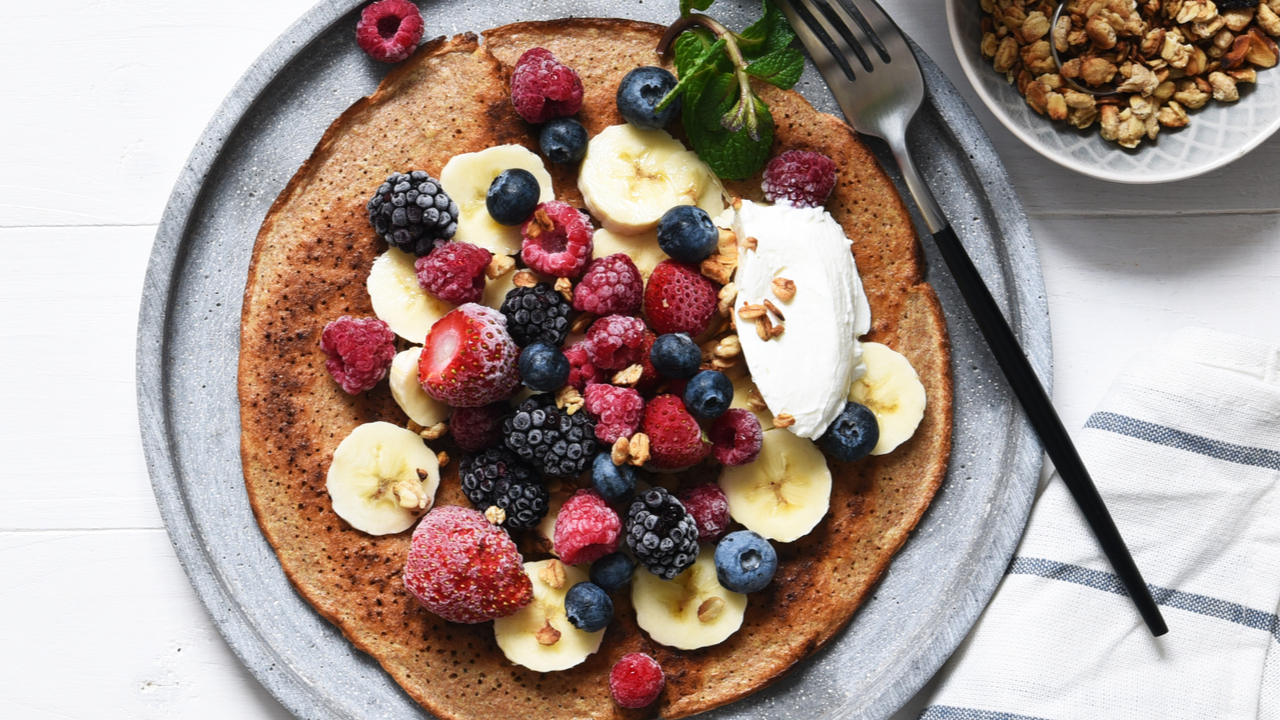 Pancakes with fruit nuts and natural yoghurt