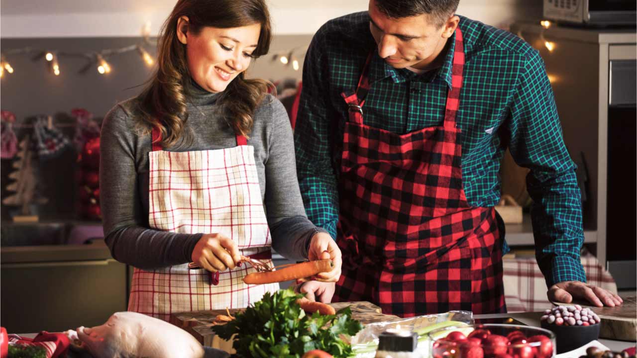 Couple preparing Christmas dinner